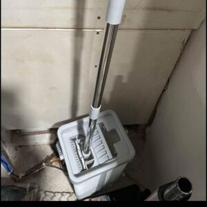 Brand new mop with reusable, washable pad